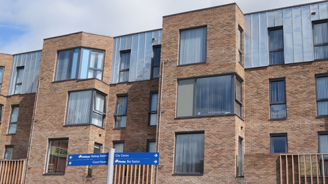 PROJECT: RESIDENTIAL APARTMENTS, LISBURN ARCHITECT: STUDIO RODGERS ARCHITECTS, COLERAINE. MATERIAL: VM NATURAL ZINC SYSTEM: TRADITIONAL STANDING SEAM CLADDING INSTALLER. EDGELINE METAL ROOFING LTD.